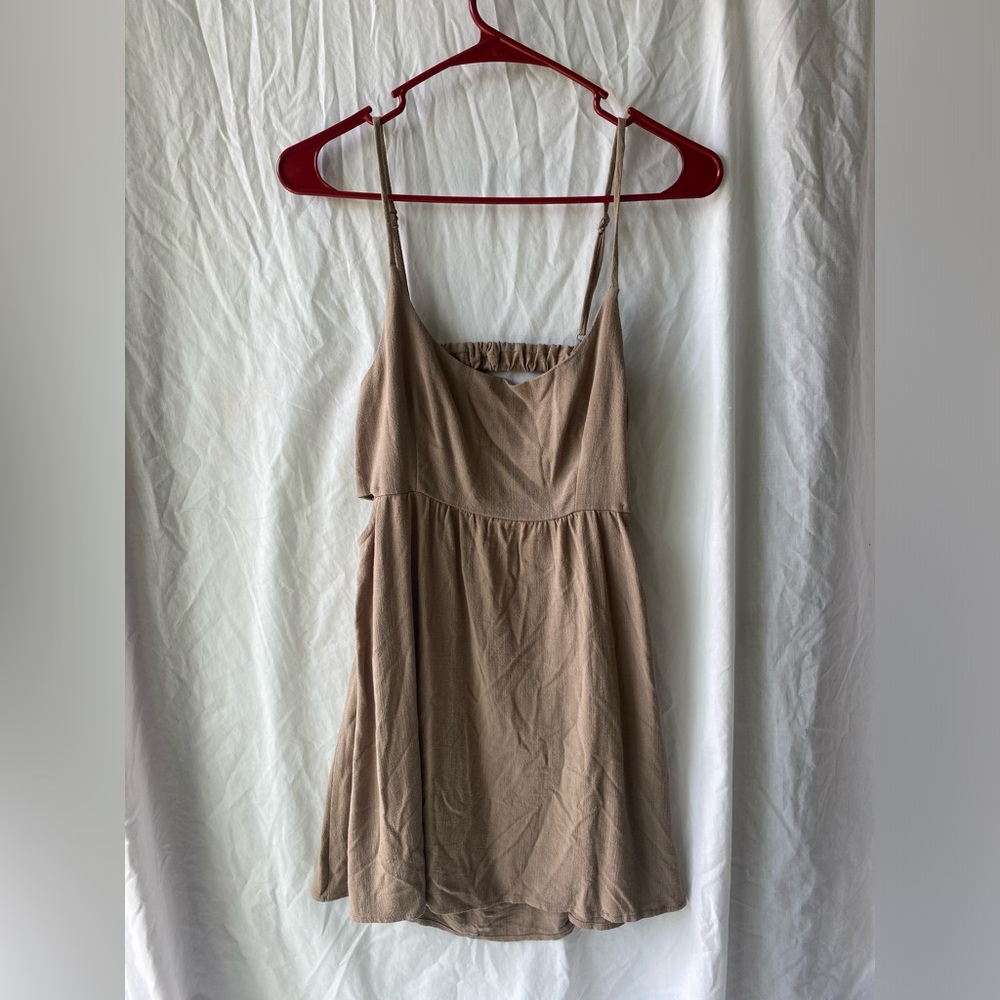 Tan mini dress with open back & cut outs on side, never worn w/ tags, Medium